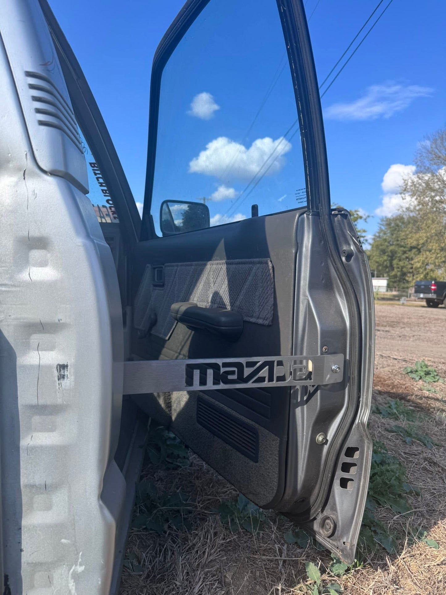 small mazda door prop